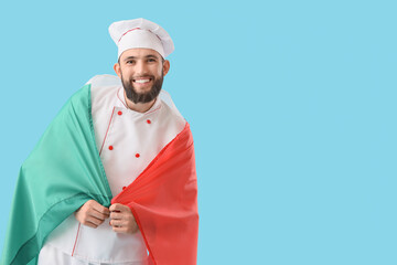 Male chef with Mexican flag on blue background