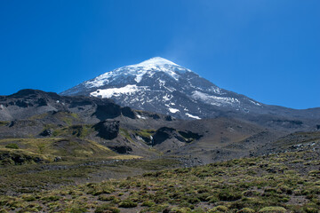 peak of cone-shaped volcano Lanin with its glacier, patagonia, argentina