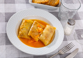 Portion of dietary cabbage leaves rolls with minced meat and rice