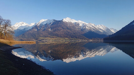 Serene alpine lake mirrored in the morning light
