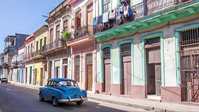 Blue classic car parked on street with colorful buildings in havana cuba view