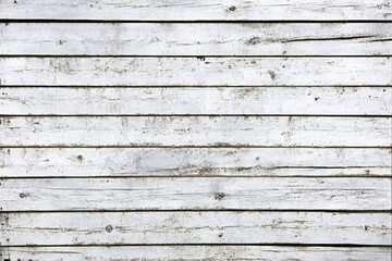 Obraz premium Horizontal weathered white wood planks texture background.