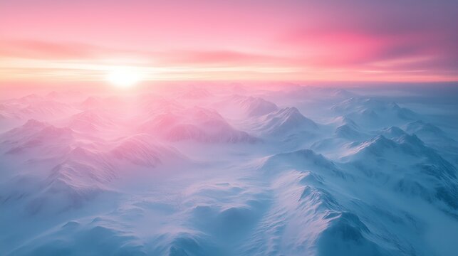 Aerial View of Blue Snow-Covered Canadian Mountain Landscape with Pink Sky