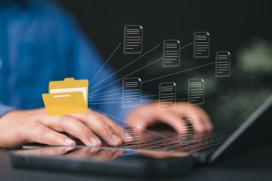 Databases, Man searching and managing files online document databases. Record keeping database technology File Access, Document Sharing, document management concepts.