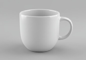 Obraz premium A simple white ceramic mug with a handle sitting on a plain light gray surface in soft studio light