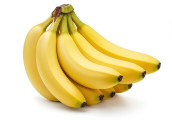 A bunch of ripe yellow bananas clustered together on a white background in a studio setting view