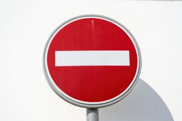 A red and white "Do Not Enter" road sign against a plain background.