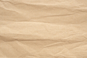 Abstract crumpled and creased recycle brown paper texture background