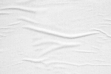 Obraz premium white crumpled and creased glued wrinkled paper poster texture background