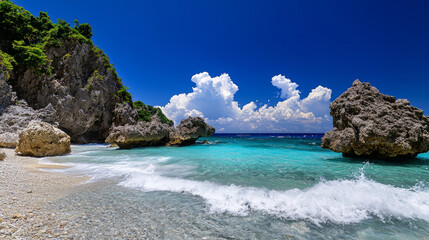 Secluded tropical beach with turquoise water, rocky cliffs, and fluffy clouds