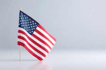 Obraz premium simple american flag placed against white background symbolizing patriotism with ample copy space