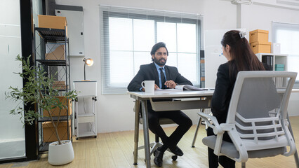 Boss and assistant are on a mission to monitor the progress of a business project