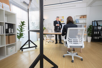 Boss and assistant are on a mission to monitor the progress of a business project