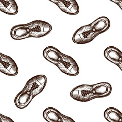 Hand drawn vintage seamless pattern of hiking boots for camping, trekking and outdoor adventure designs, rustic travel gear sketch