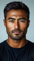 Fototapeta premium Portrait of a Handsome Man with Dark Hair and Beard