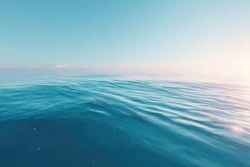 Fototapeta premium serene minimalistic ocean scene capturing vastness and tranquility of sea with clear horizon and gentle wave motion
