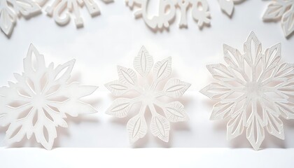 close up of paper flowers on a white surface