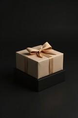 Obraz premium Simple gift box on a black background wrapped in plain beige ribbon with a small matching brown bow, present, bow
