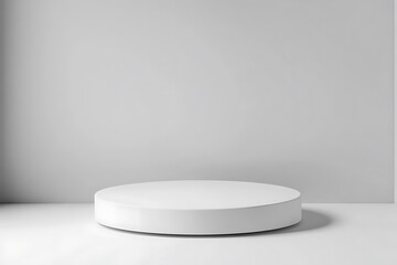 Simple white round pedestal on a clean backdrop