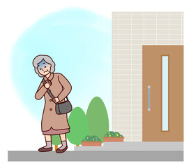 胸を掴んで苦しむ高齢女性