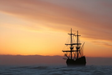 silhouetted pirate ship sails against sunset sky