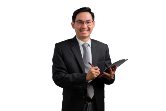 Confident Asian businessman in suit holding clipboard and writing, isolated on transparent background