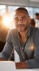 Businessman in office,  smiling at camera, laptop on desk, natural light, professional