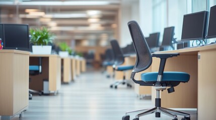 Empty office chairs, desks, computers