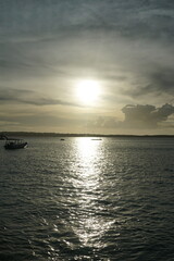 Sunset reflection over tranquil water coastal area nature scene serene atmosphere wide angle peaceful serenity