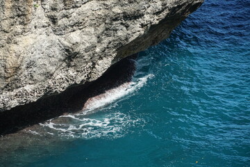 Waves crashing against rocky coast ocean view nature photography sunny day aerial perspective coastal beauty