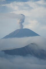 Volcanic eruption event mountain location natural phenomenon content cloudy environment aerial viewpoint earth science concept for seo impact