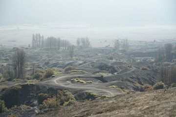 Desolate landscape recovery after volcanic eruption abandoned terrain nature photography aerial view resilience in adversity