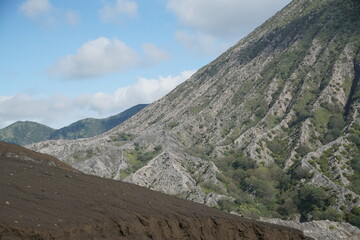 Mountains erupting from a lush green landscape nature photography bali scenic view outdoor adventure