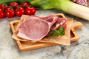Raw pork steak loin with bone