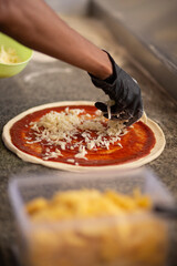Adding Cheese to Pizza Base