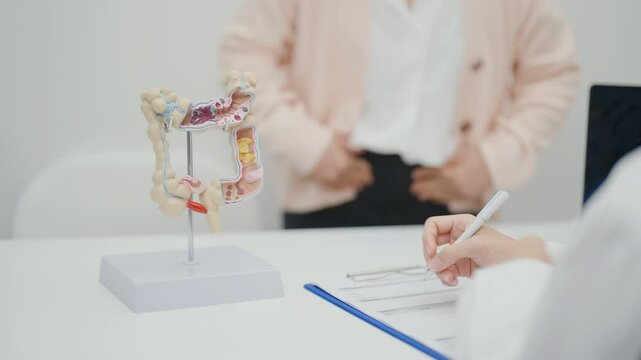Elderly woman Patient consultation with doctor for Colon disease, Large Intestine, Colorectal cancer, Ulcerative colitis, Diverticulitis, Irritable bowel syndrome, Digestive system and Healthcare