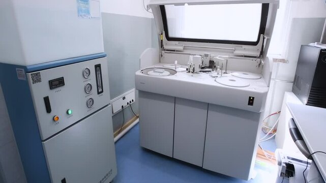 Science laboratory specimens analyzer device for working with blood, urine, biomaterials samples in chemistry test analysis machine using automation robotics. Modern medical computerized equipment