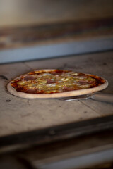 Hawaiian Pizza with Ham and Pineapple Inside Oven