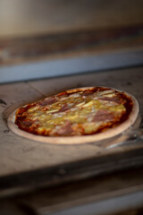 Hawaiian Pizza with Ham and Pineapple Inside Oven