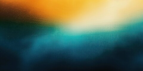 Fototapeta premium abstract blurred background with warm golden light blending into deep blue and teal shades creating a calm and serene atmosphere