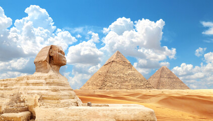 Famous Great Sphinx and pyramids of Chephren and Cheops, Cairo, Egypt. Great Pyramids and statue of...