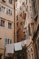 Narrow Alley with Laundry in Historic Building