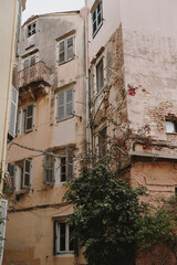 Weathered Buildings with Greenery in Urban Setting
