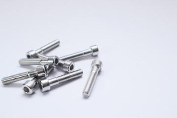 Steel bolts isolated on white. Constructional still life.