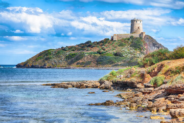 Fabulous view on Ancient Spanish tower of Coltellazzo of Saint Efisio lighthouse at Nora...
