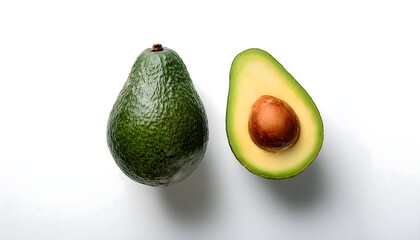 Top view of a healthy avocado cut in half, seed visible, placed on white background.