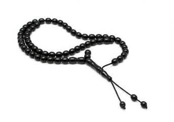 Fototapeta premium Black prayer beads isolated on white background