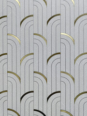 Detail close up of a mosaic made of ceramics and metallic sheet.