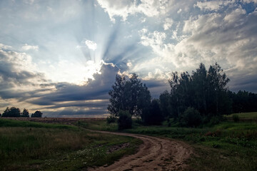 Dirt road in the countryside on a cloudy day