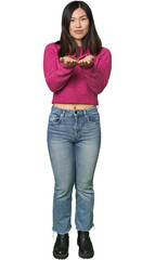 Full-body young Chinese woman holding something with palms, offering to camera.